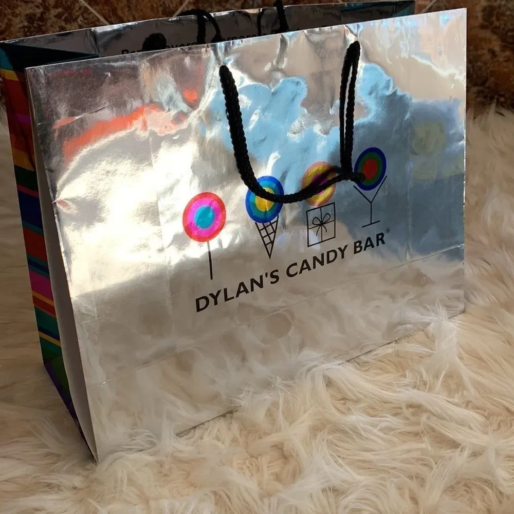Dylan’s Candy Bar Paper Shopping Bags. One Black and One Silver Metallic.